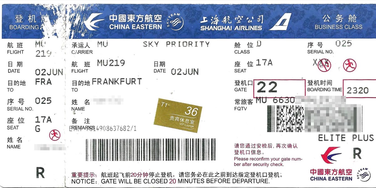 A China Eastern boarding pass with the Class box showing the letter D